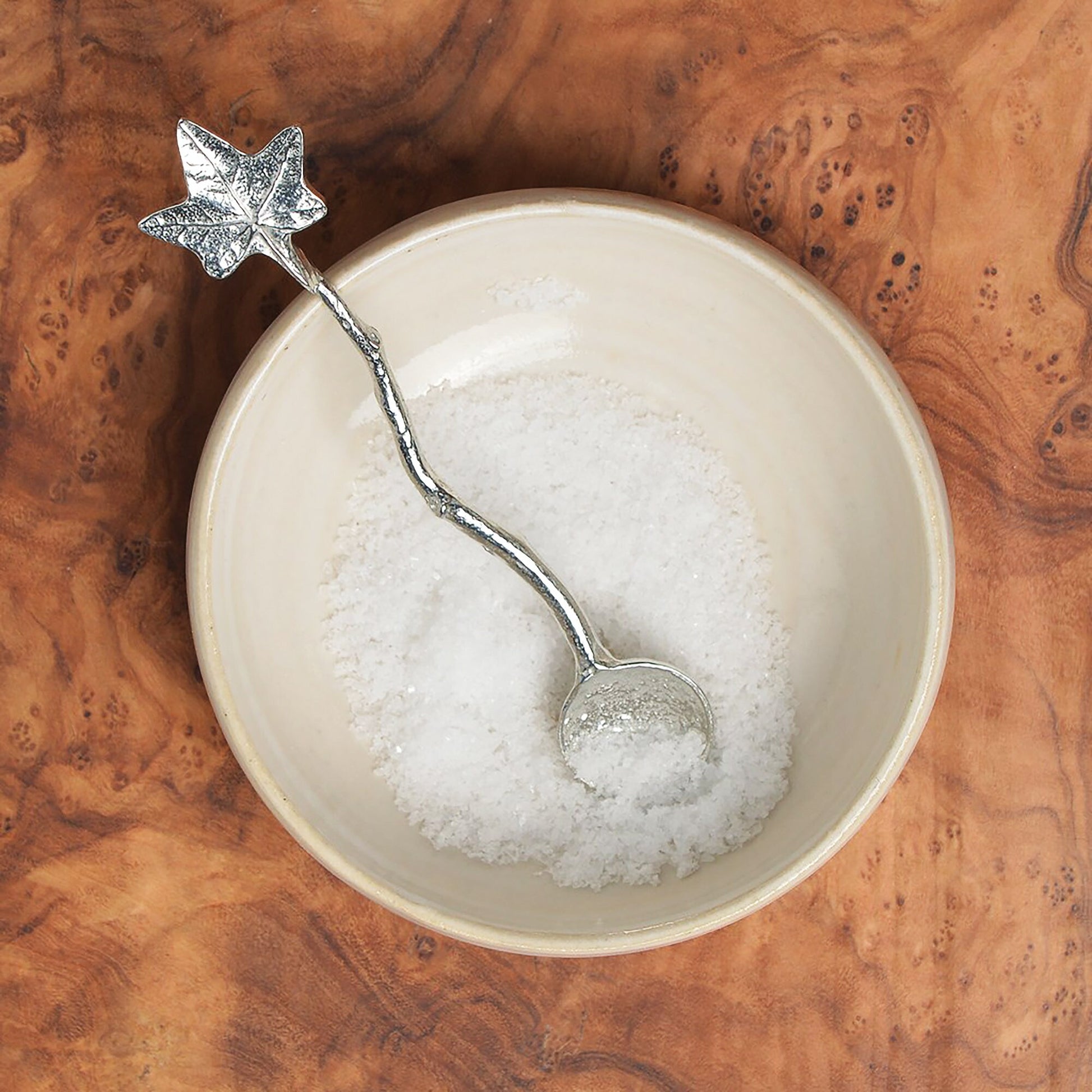 a tiny spice, salt or condiment spoon. Our pewter spoon has a small 10mm bowl leading up a fine twig textured handle to a small ivy leaf. Gifts for nature lovers.