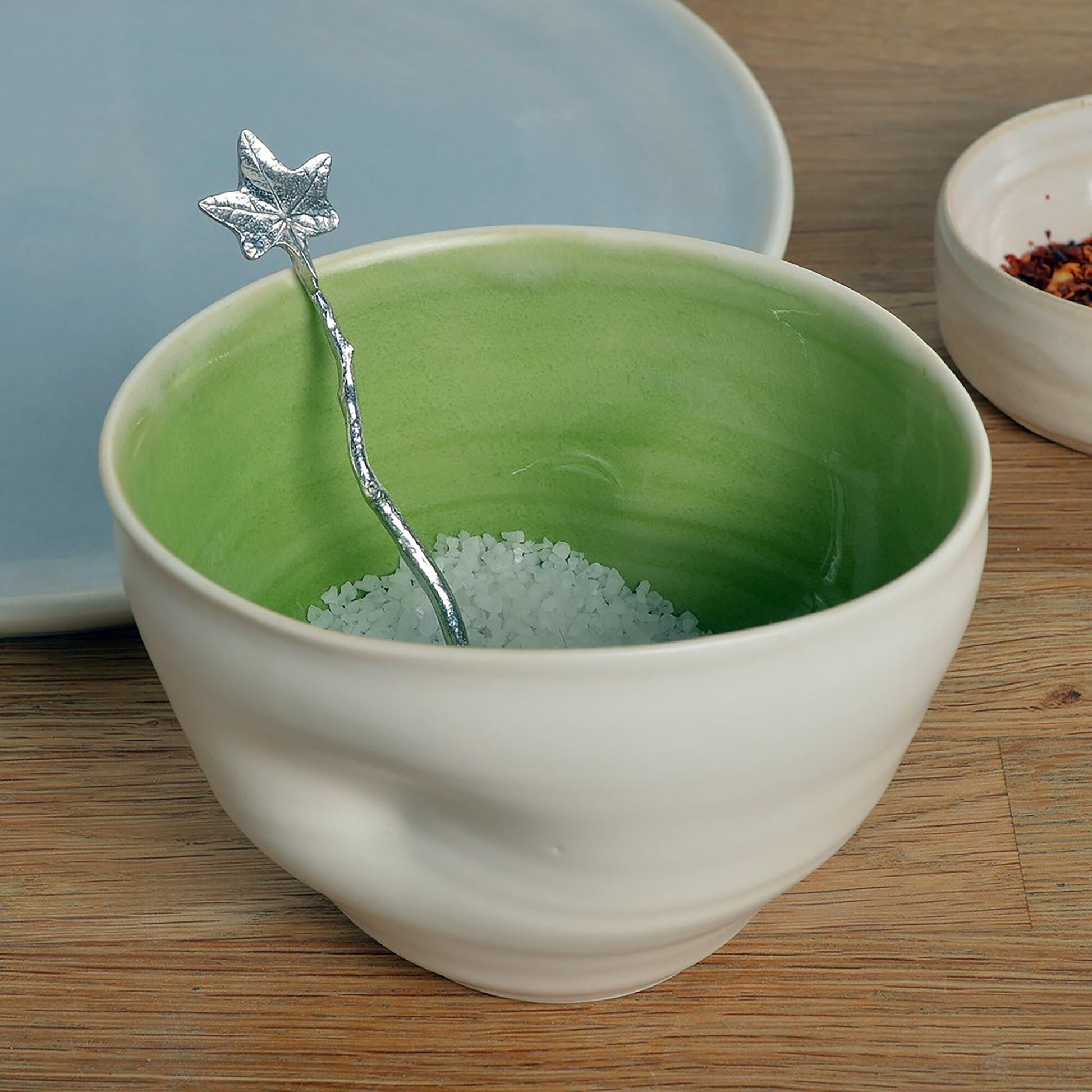 a tiny spice, salt or condiment spoon. Our pewter spoon has a small 10mm bowl leading up a fine twig textured handle to a small ivy leaf. Gifts for nature lovers.