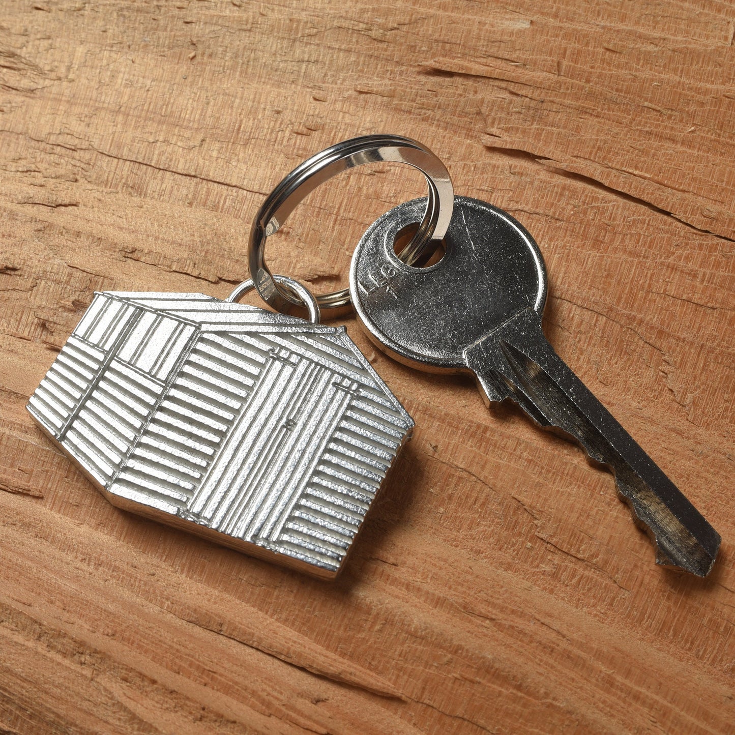 A solid pewter garden shed keyring on a quality stainless steel ring. Gifts for gardeners, gardeners gifts, useful gifts, housewarming gifts handmade in the UK