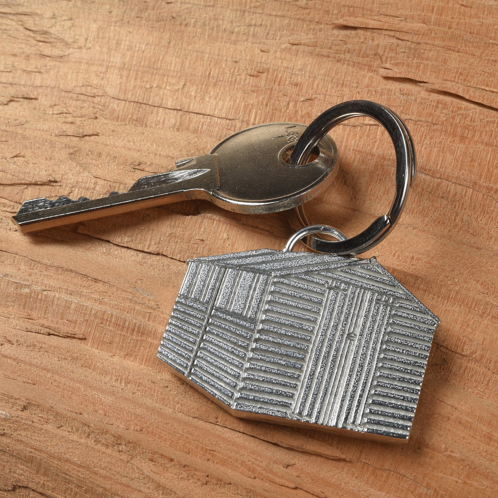 A solid pewter garden shed keyring on a quality stainless steel ring. Gifts for gardeners, gardeners gifts, useful gifts, housewarming gifts handmade in the UK