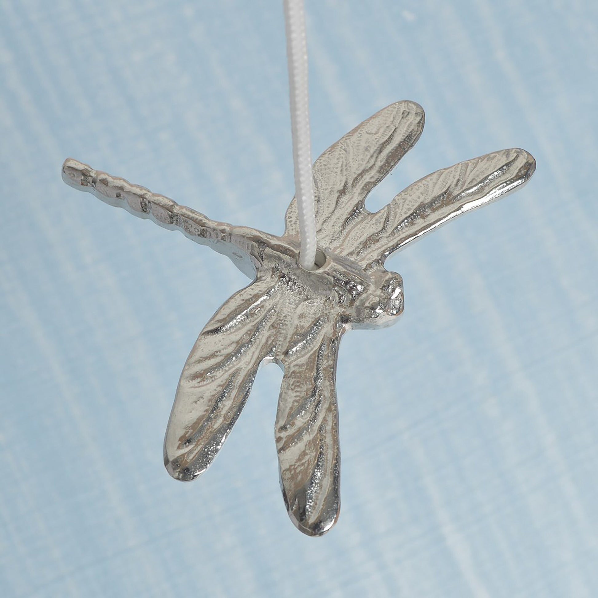 Dragonfly bathroom light pull or cord pull. A tactile and decorative pewter dragonfly hangs at the bottom of the bathroom light switch cord. ideal little housewarming gifts. Dragonfly gifts.