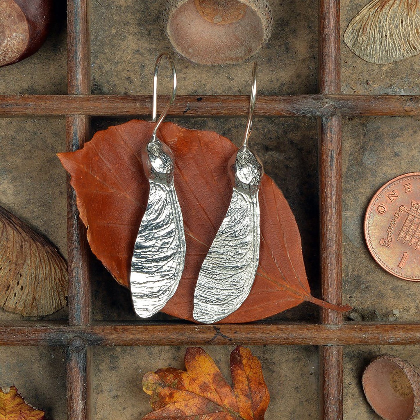 Sycamore key drop earrings, pewter sycamore keys on Sterling silver ear hooks. Pewter and silver sycamore key jewellery gifts, handmade in the UK by Glover and Smith