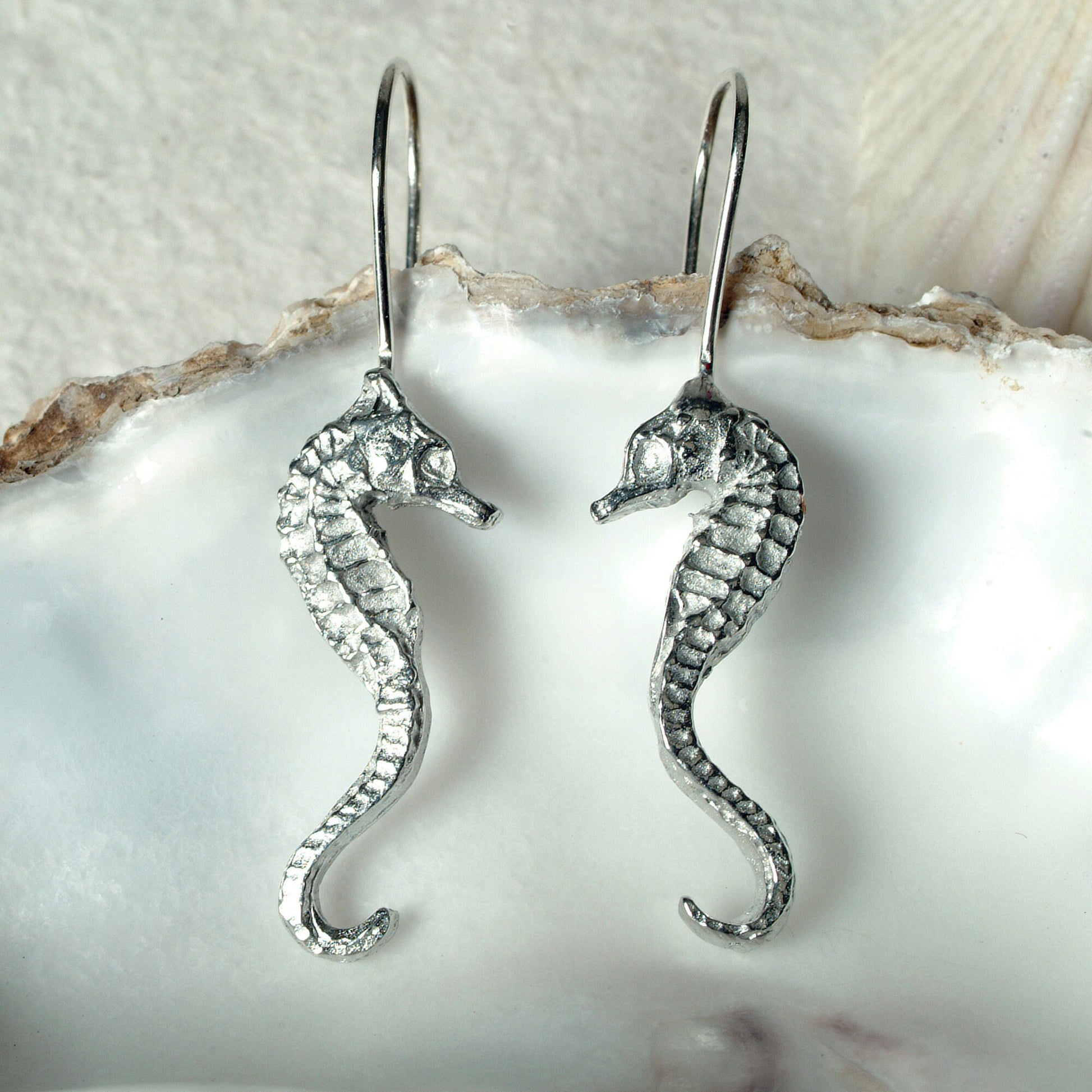 Seahorse drop earrings, pewter seahorses on Sterling silver ear hooks. Pewter and silver seahorse jewellery gifts, handmade in the UK by Glover and Smith