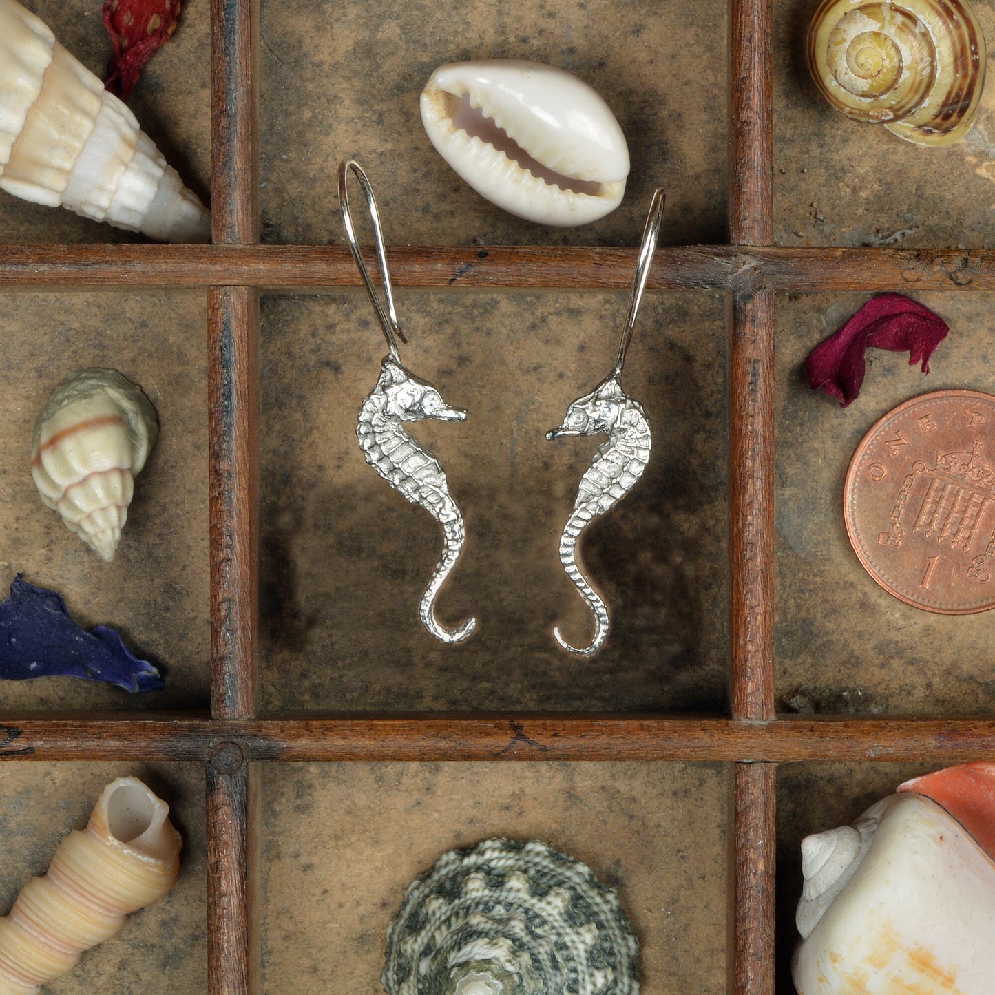 Seahorse drop earrings, pewter seahorses on Sterling silver ear hooks. Pewter and silver seahorse jewellery gifts, handmade in the UK by Glover and Smith