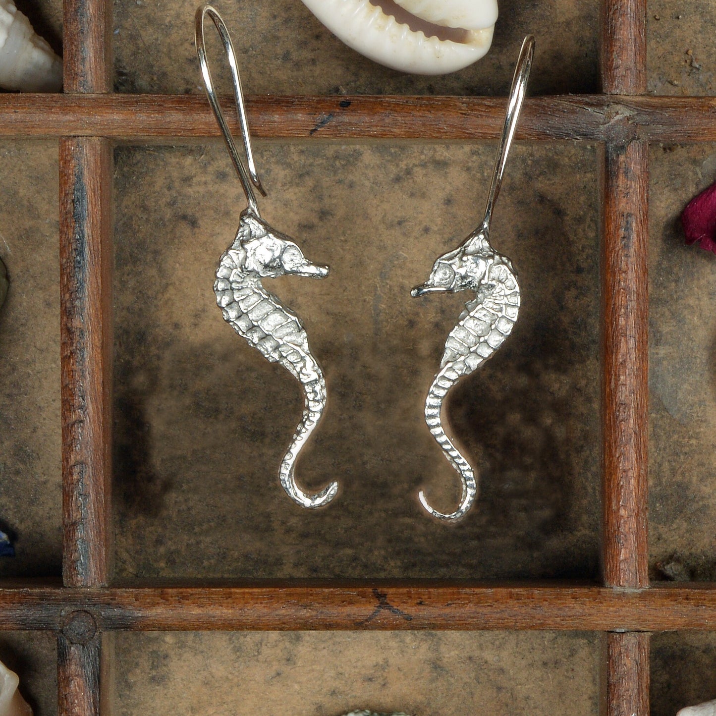 Seahorse drop earrings, pewter seahorses on Sterling silver ear hooks. Pewter and silver seahorse jewellery gifts, handmade in the UK by Glover and Smith