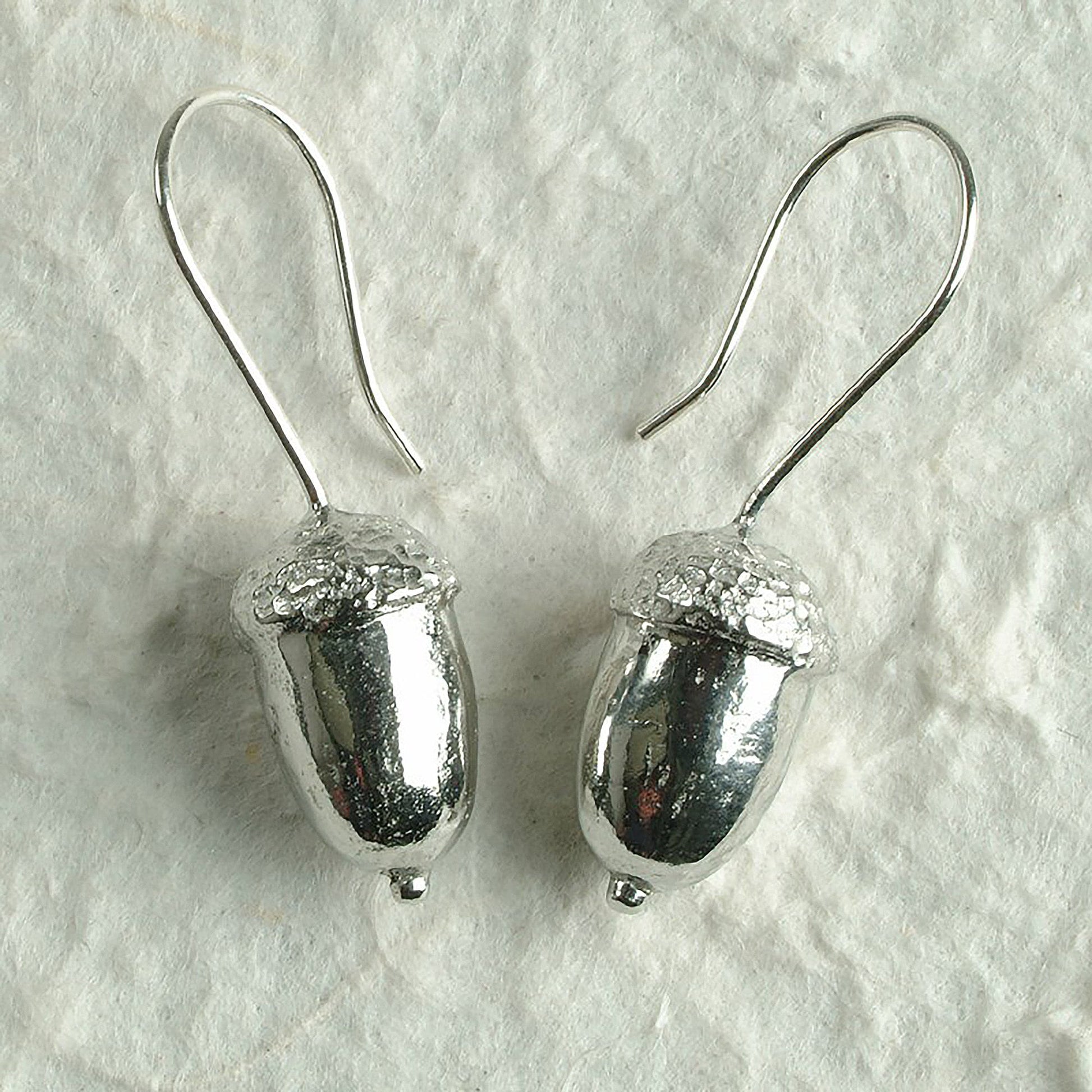 Acorn drop earrings, pewter acorns on Sterling silver ear hooks. Pewter and silver acorn jewellery gifts, handmade in the UK by Glover and Smith