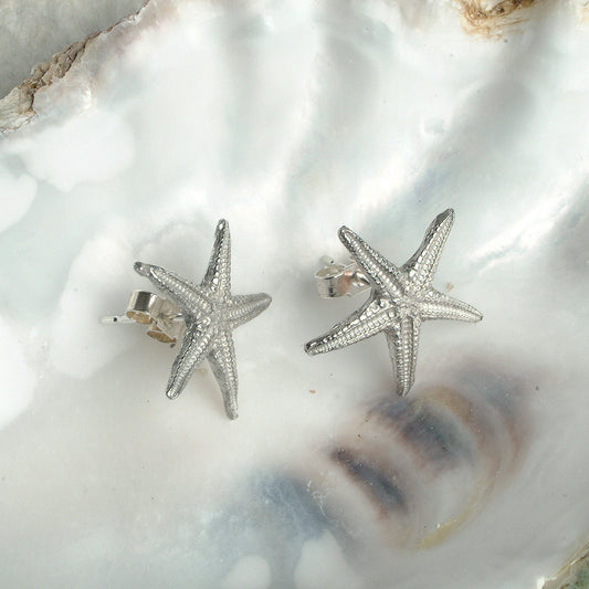 Starfish stud earrings, pewter starfish on Sterling silver stud posts. Pewter and silver starfish jewellery gifts, handmade in the UK by Glover and Smith