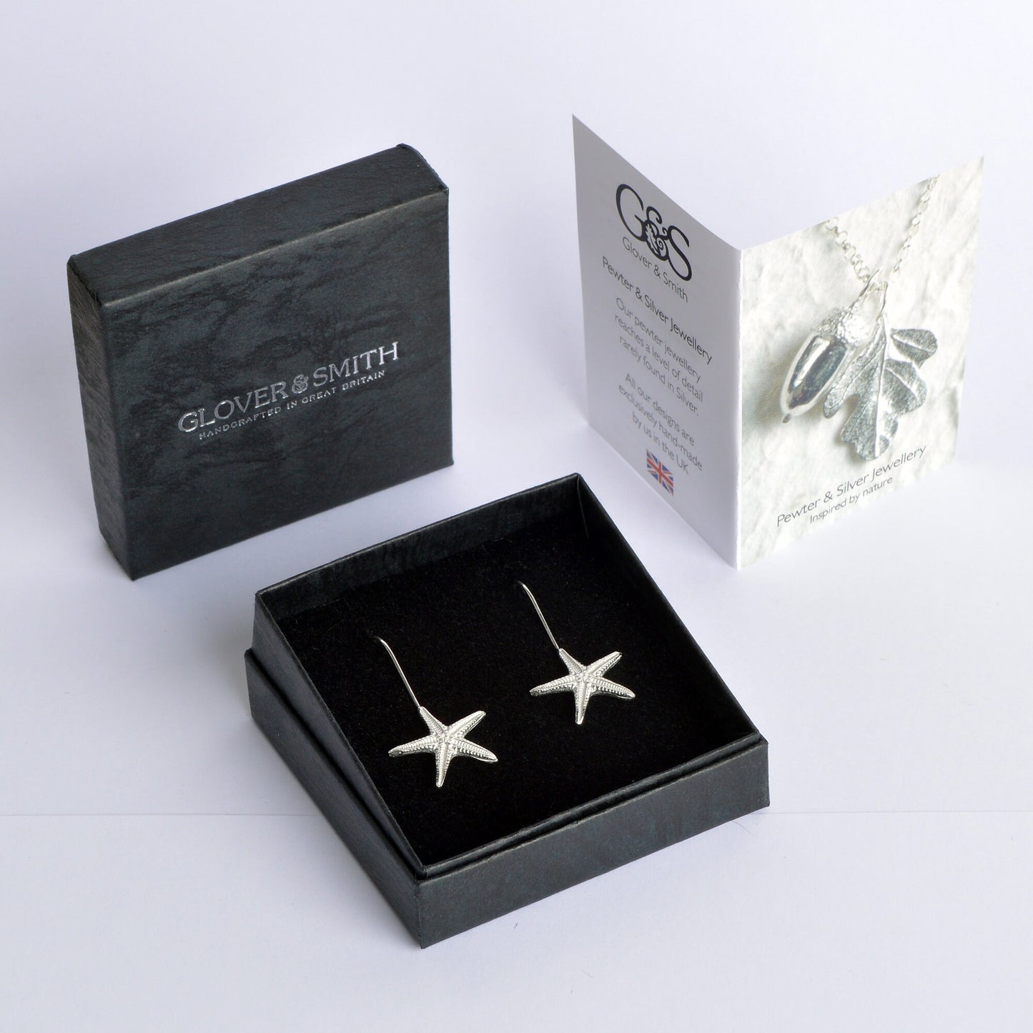 Starfish drop earrings, pewter starfishes on Sterling silver ear hooks. Pewter and silver starfish jewellery gifts, handmade in the UK by Glover and Smith