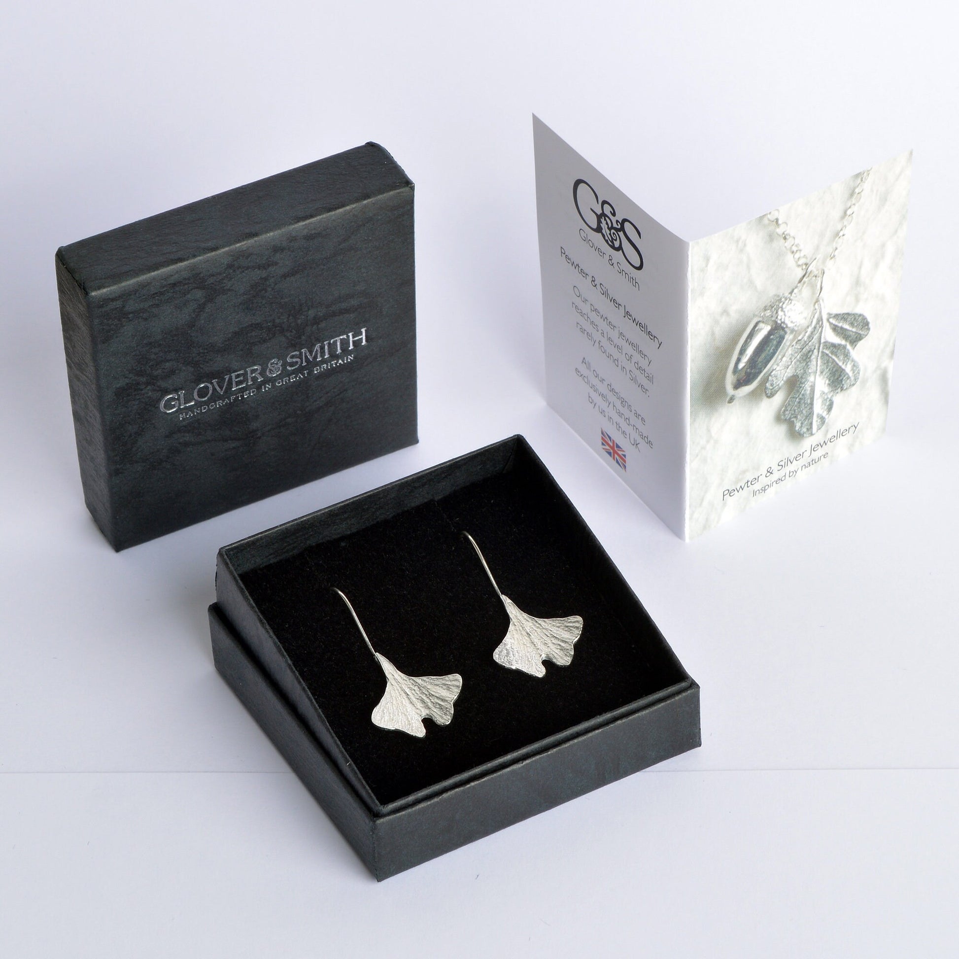 Ginkgo leaf drop earrings, pewter ginkgo leaves on Sterling silver ear hooks. Pewter and silver ginkgo leaf jewellery gifts, handmade in the UK by Glover and Smith