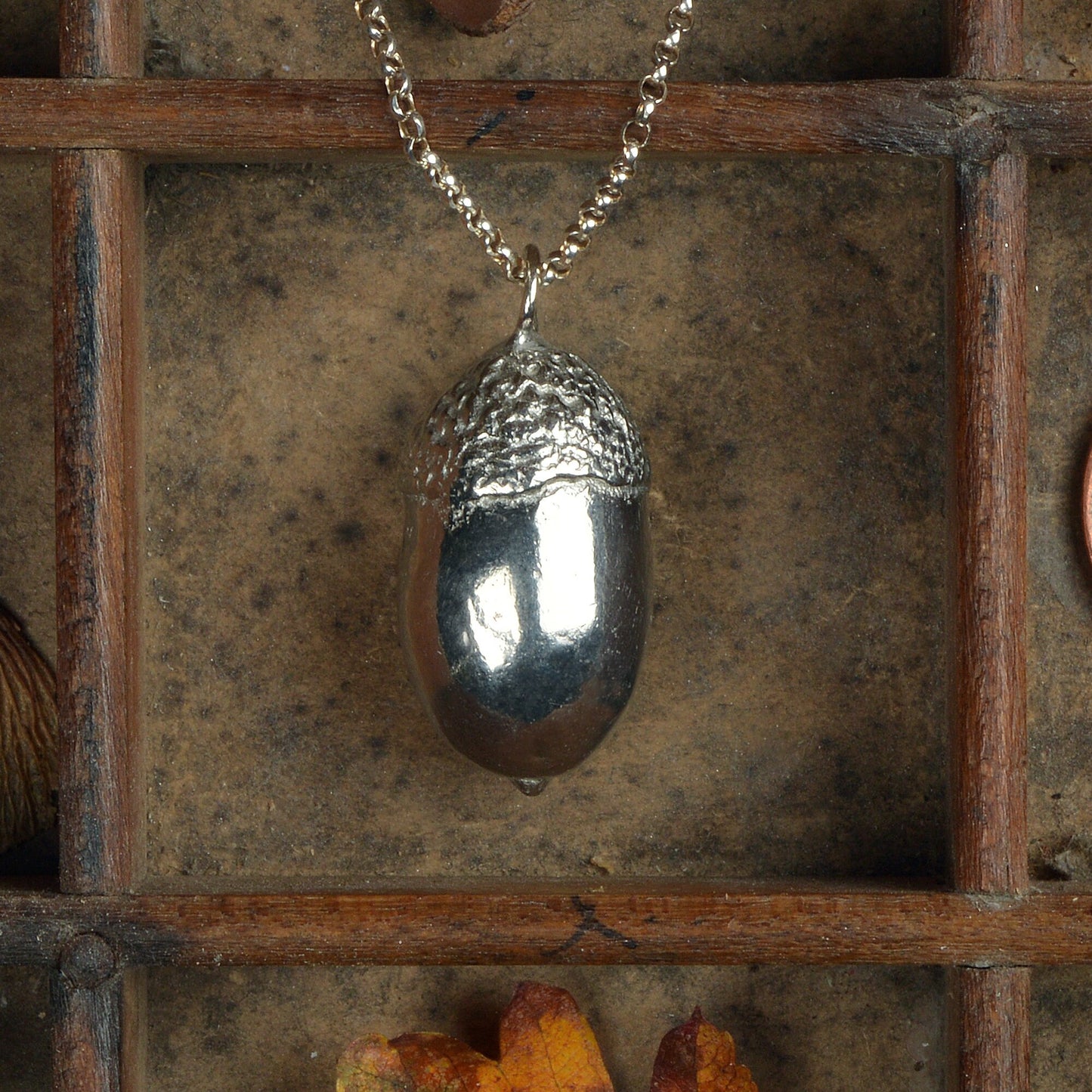 A detailed pewter acorn necklace on an 18" Sterling silver chain. Gifts for nature lovers, acorn jewellery. Great jewellery gifts for her. The perfect 10th tin 10 year wedding anniversary gift (Our pewter is 95% tin). Made in Britain with love.