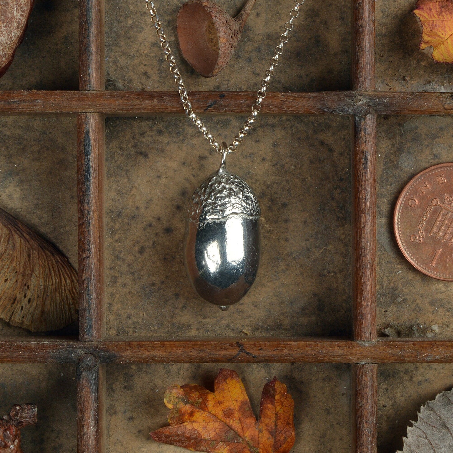 A detailed pewter acorn necklace on an 18" Sterling silver chain. Gifts for nature lovers, acorn jewellery. Great jewellery gifts for her. The perfect 10th tin 10 year wedding anniversary gift (Our pewter is 95% tin). Made in Britain with love.