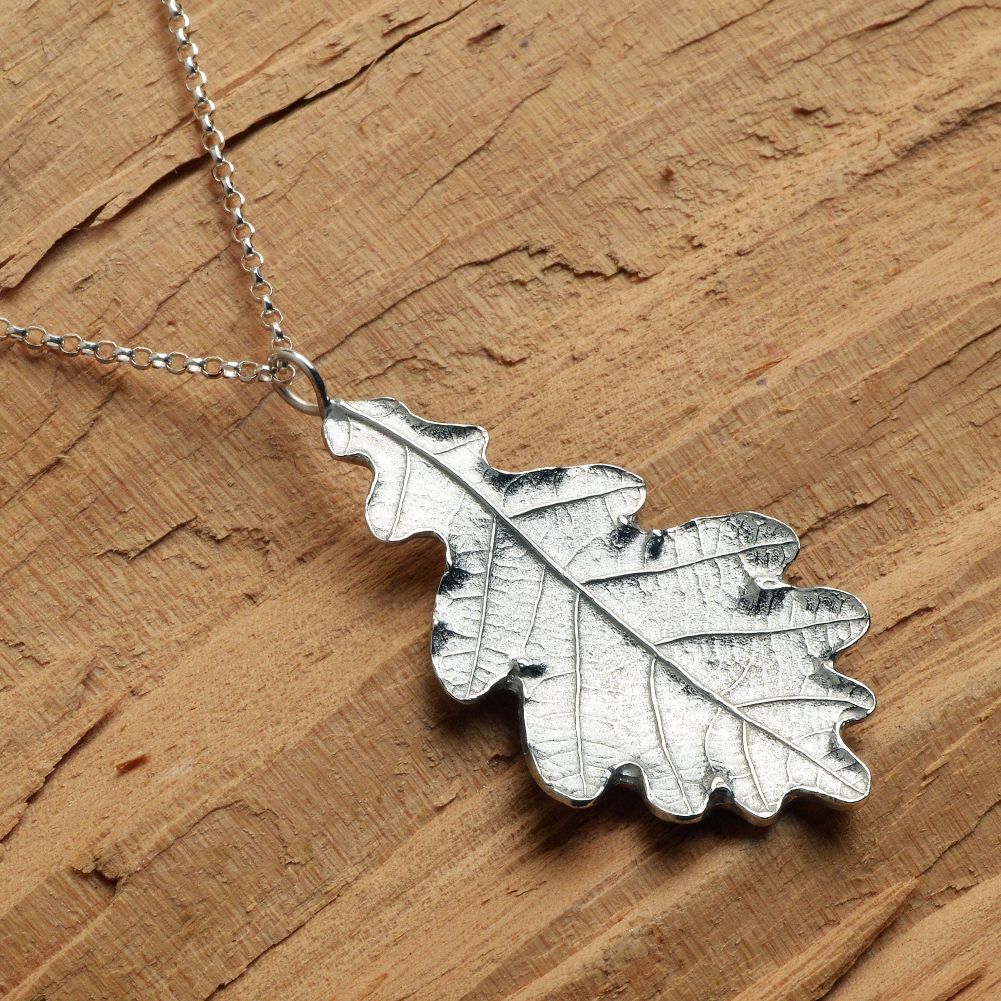 A detailed pewter oak leaf necklace on an 18" Sterling silver chain. Gifts for nature lovers, oak jewellery. Great jewellery gifts for her. The perfect 10th tin 10 year wedding anniversary gift (Our pewter is 95% tin). Made in Britain with love.