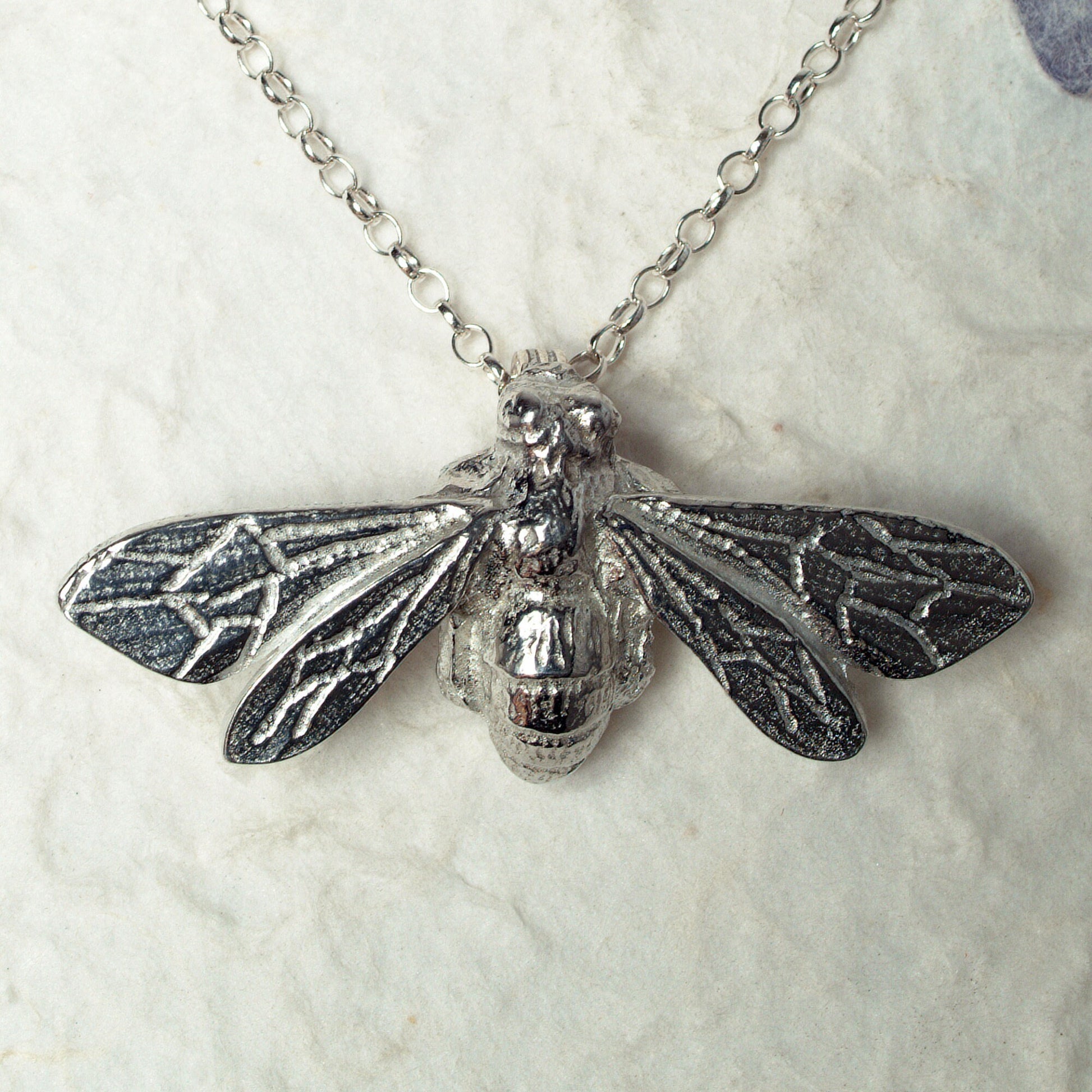 A delicate and detailed pewter larger bee necklace on an 18" Sterling silver chain. Great jewellery gifts for her, bee gifts for bee lovers. The perfect 10th tin 10 year wedding anniversary gift (Our pewter is 95% tin). Made in Britain with love. 