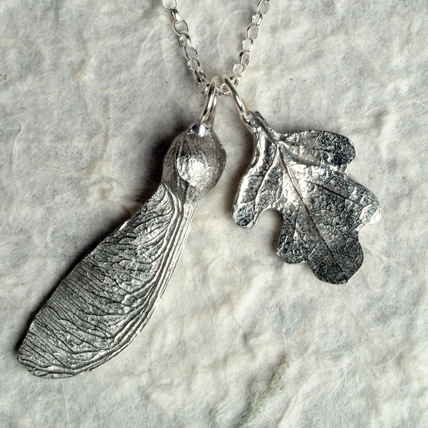 A detailed pewter oak leaf & sycamore key necklace on an 18" Sterling silver chain. Gifts for nature lovers, oak leaf jewellery. Great jewellery gifts for her. The perfect 10th tin 10 year wedding anniversary gift (Our pewter is 95% tin). Made in Britain with love.