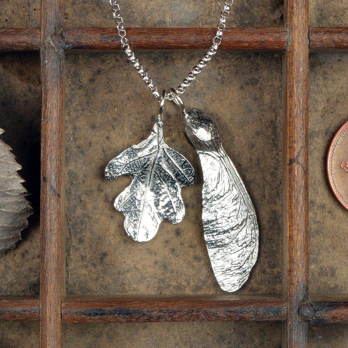 A detailed pewter oak leaf & sycamore key necklace on an 18" Sterling silver chain. Gifts for nature lovers, oak leaf jewellery. Great jewellery gifts for her. The perfect 10th tin 10 year wedding anniversary gift (Our pewter is 95% tin). Made in Britain with love.