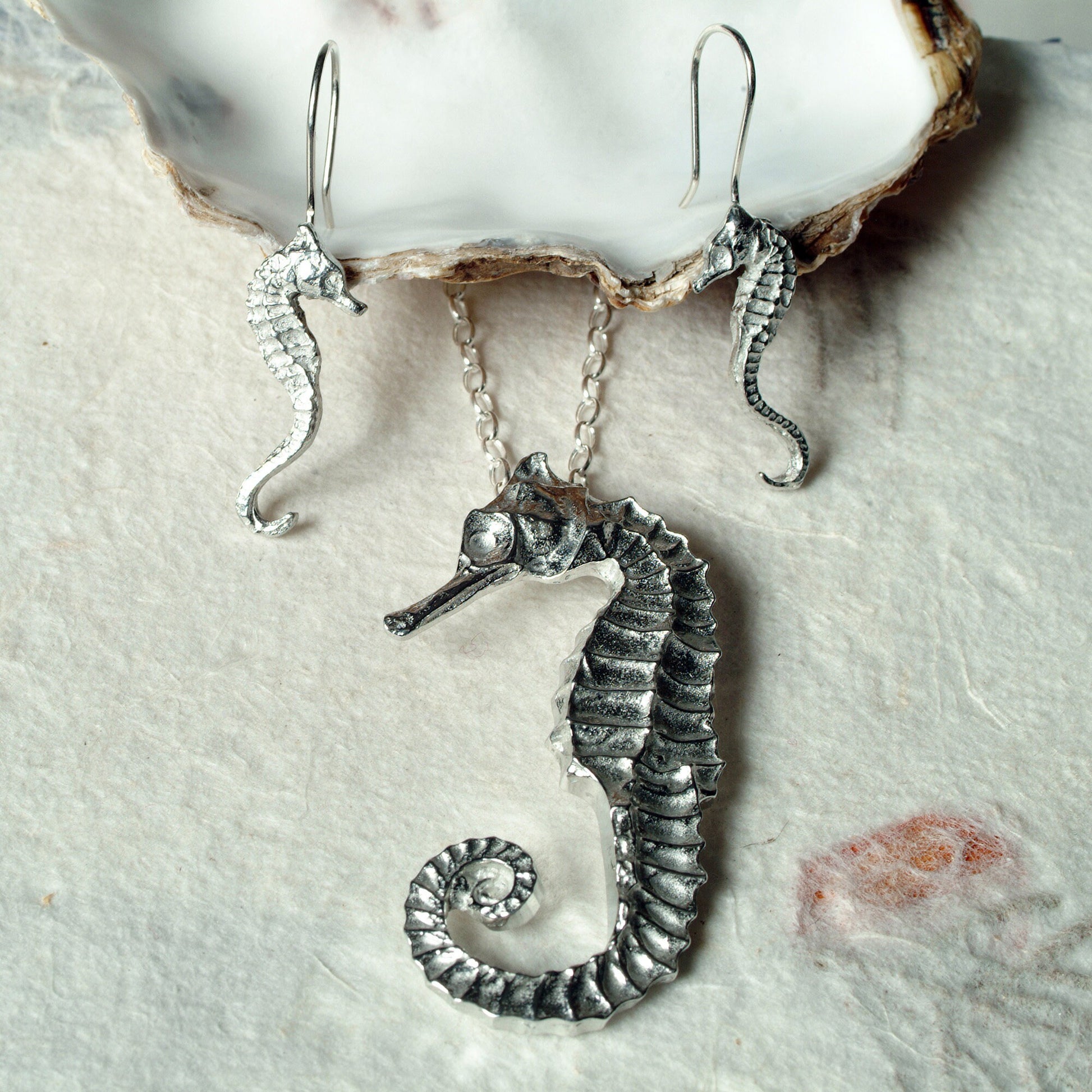 A delicate and detailed pewter seahorse necklace on an 18" Sterling silver chain. Great jewellery gifts for her, nautical gifts for seahorse lovers. The perfect 10th tin 10 year wedding anniversary gift (Our pewter is 95% tin). Made in Britain with love. 