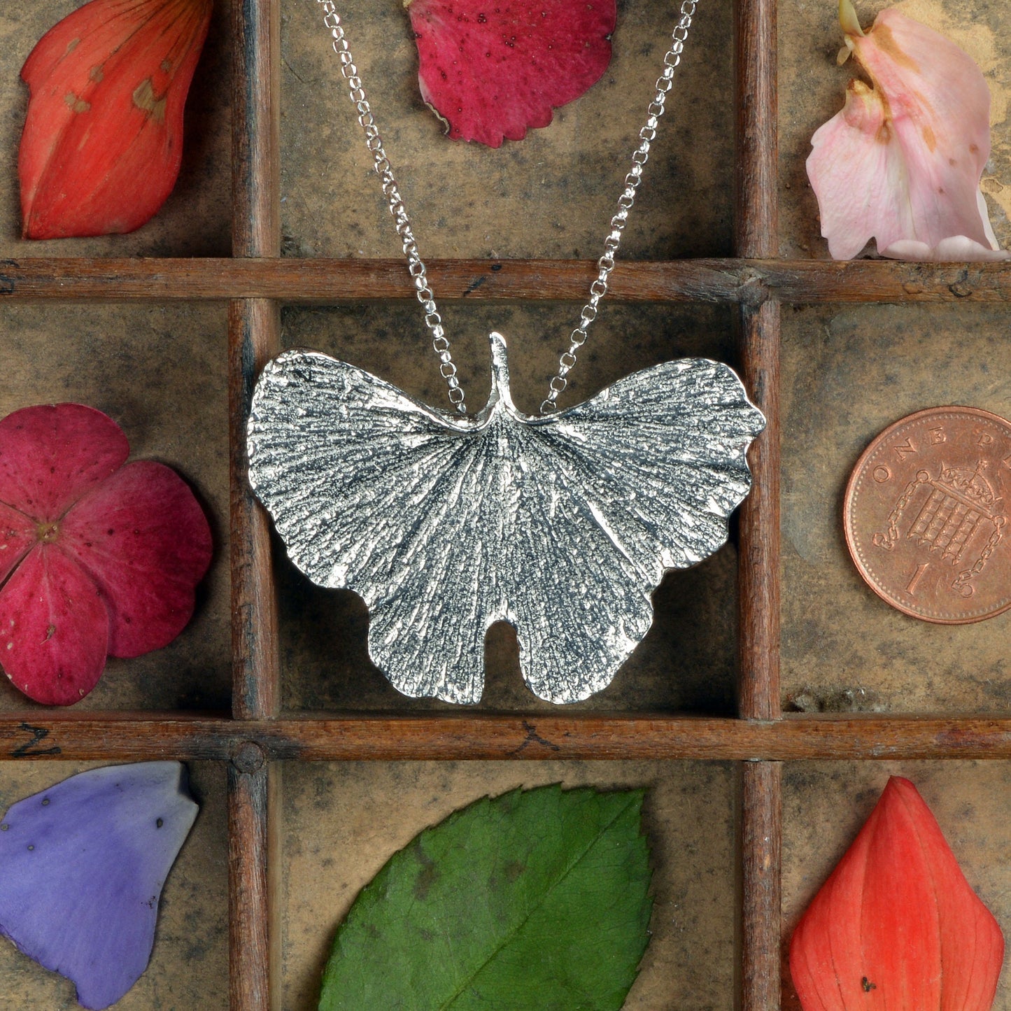 A detailed pewter ginkgo leaf necklace on an 18" Sterling silver chain. Gifts for nature lovers, ginkgo leaf jewellery. Great jewellery gifts for her. The perfect 10th tin 10 year wedding anniversary gift (Our pewter is 95% tin). Made in Britain with love.