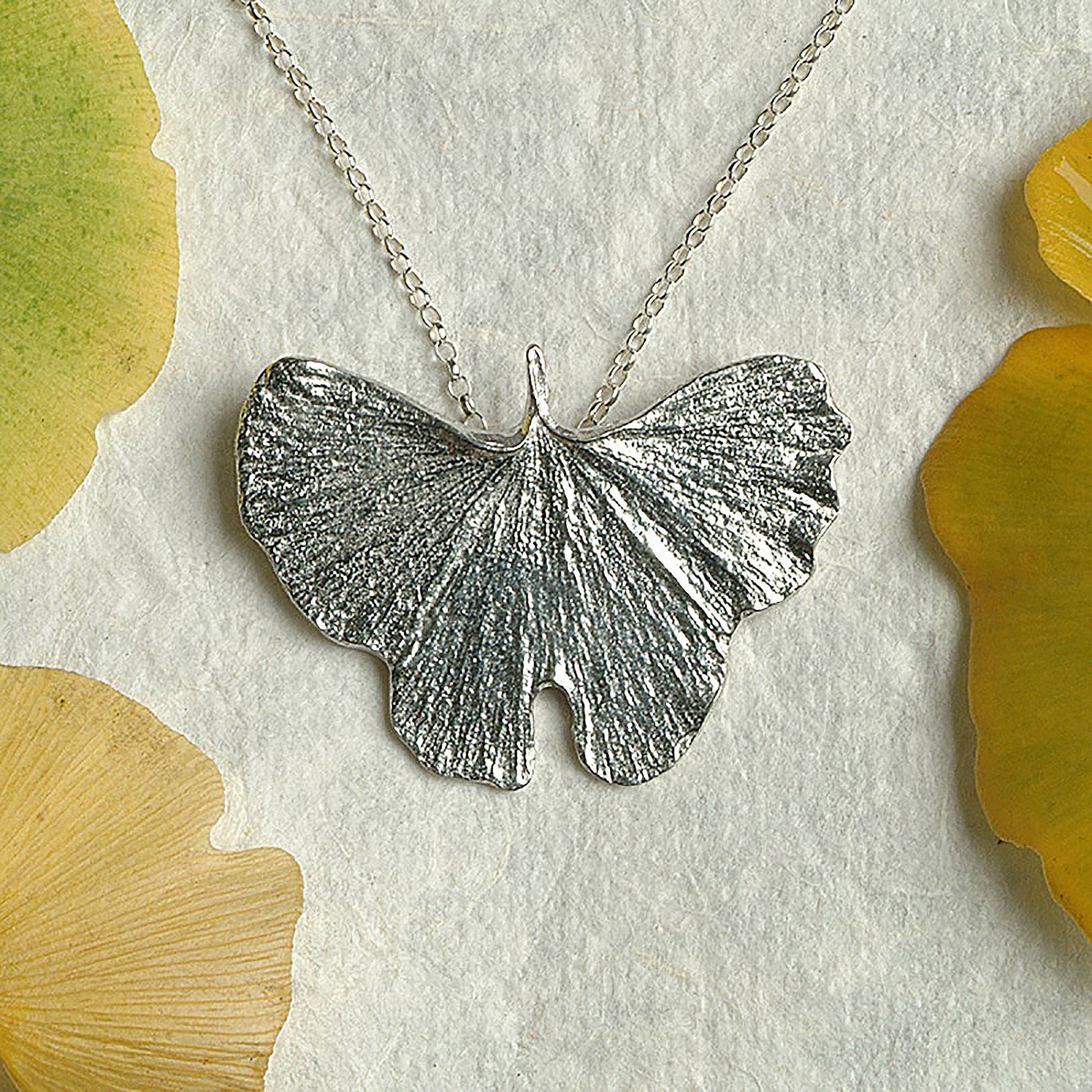 A detailed pewter ginkgo leaf necklace on an 18" Sterling silver chain. Gifts for nature lovers, ginkgo leaf jewellery. Great jewellery gifts for her. The perfect 10th tin 10 year wedding anniversary gift (Our pewter is 95% tin). Made in Britain with love.