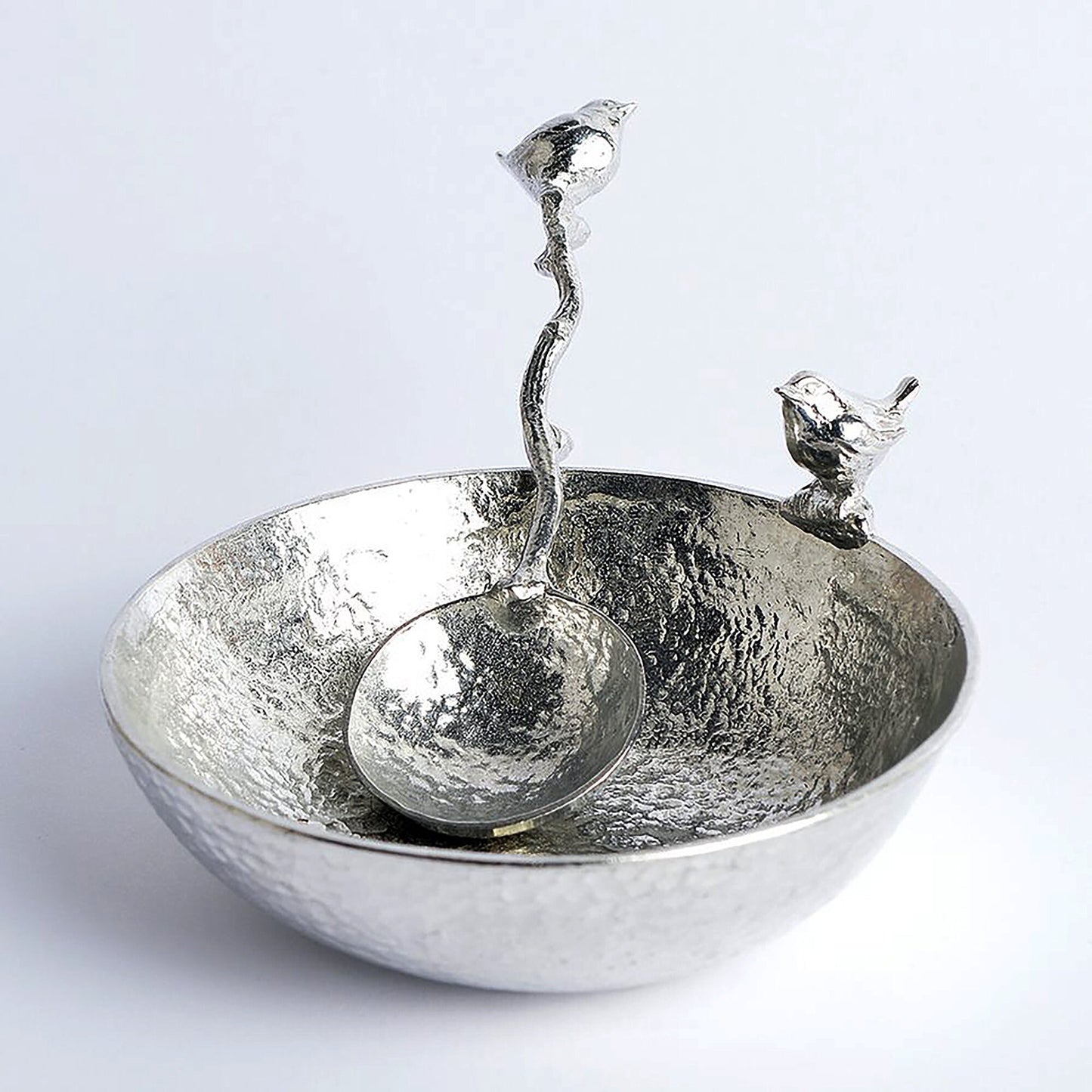 A 9cm diameter textured circular pewter bowl, with a wren bird perched on the edge of the dish, comes with matching wren spoon. Bird gifts. The ideal gift for any lover of birds, the natural world and the great outdoors.