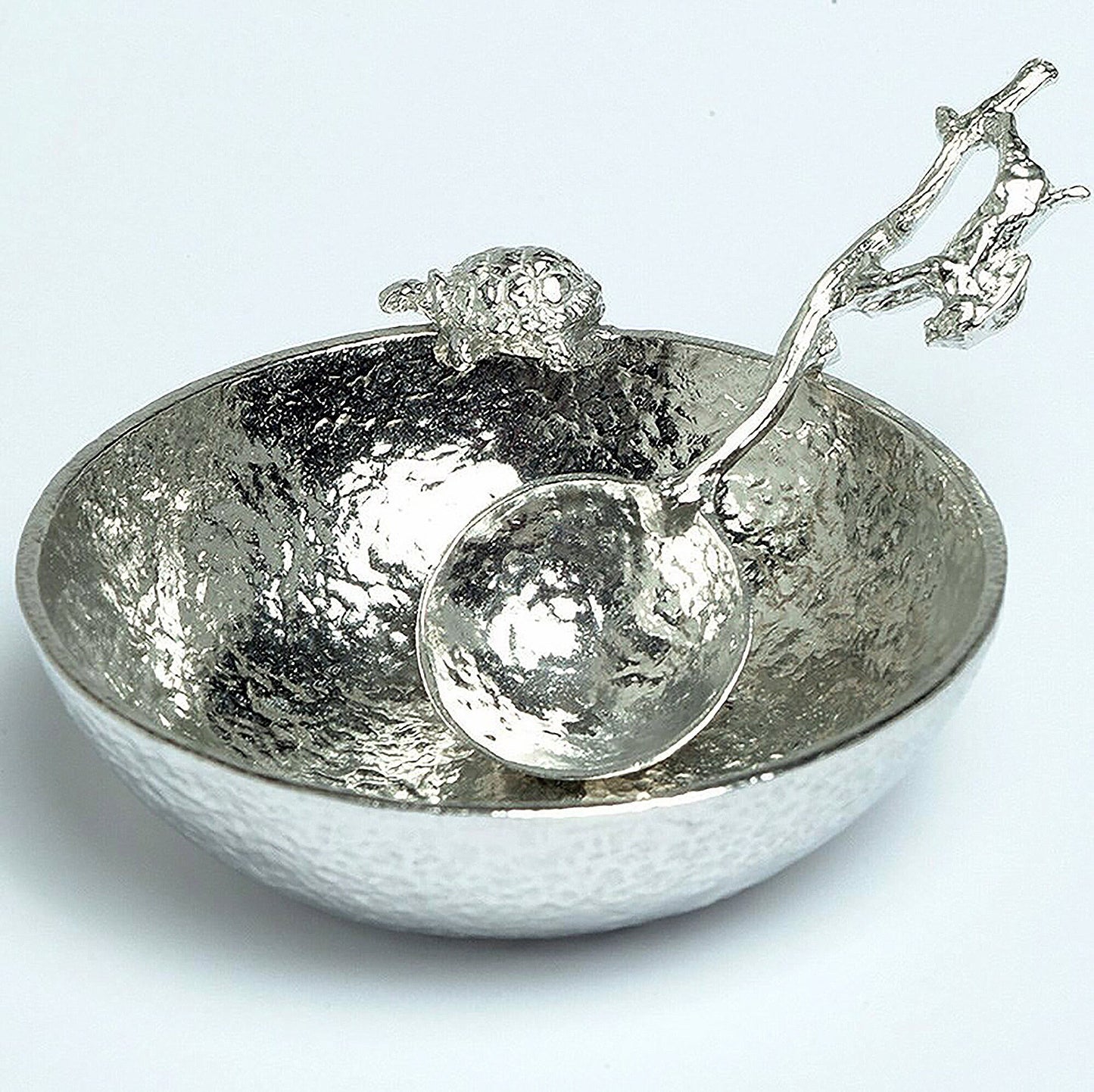 Hare and Tortoise pewter bowl and spoon set. A 9cm diameter textured circular pewter bowl, inspired by the well-known Aesop fable, with a delightful tortoise on the edge of the dish & an accompanying hare spoon. UK handmade