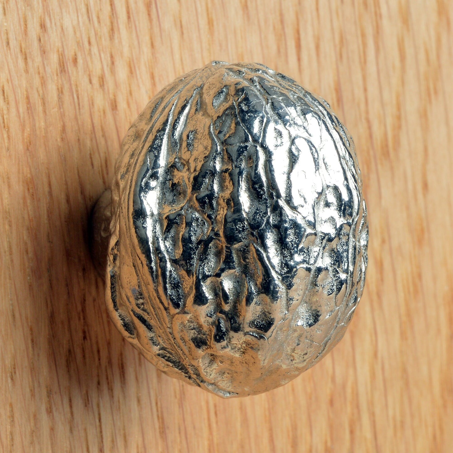 A solid pewter cabinet handle, cupboard knob, furniture handle or drawer pull in the shape of a detailed walnut. Organic, unusual handles UK handmade with finesse