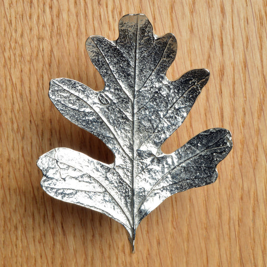 A solid pewter cabinet handle, cupboard knob, furniture handle or drawer pull in the shape of a detailed hawthorn leaf. Organic, unusual handles UK handmade with finesse