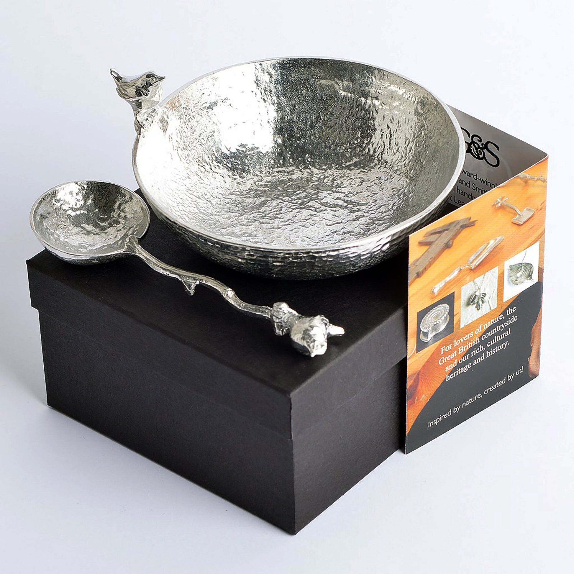 A 9cm diameter textured circular pewter bowl, with a wren bird perched on the edge of the dish, comes with matching wren spoon. Bird gifts. The ideal gift for any lover of birds, the natural world and the great outdoors.