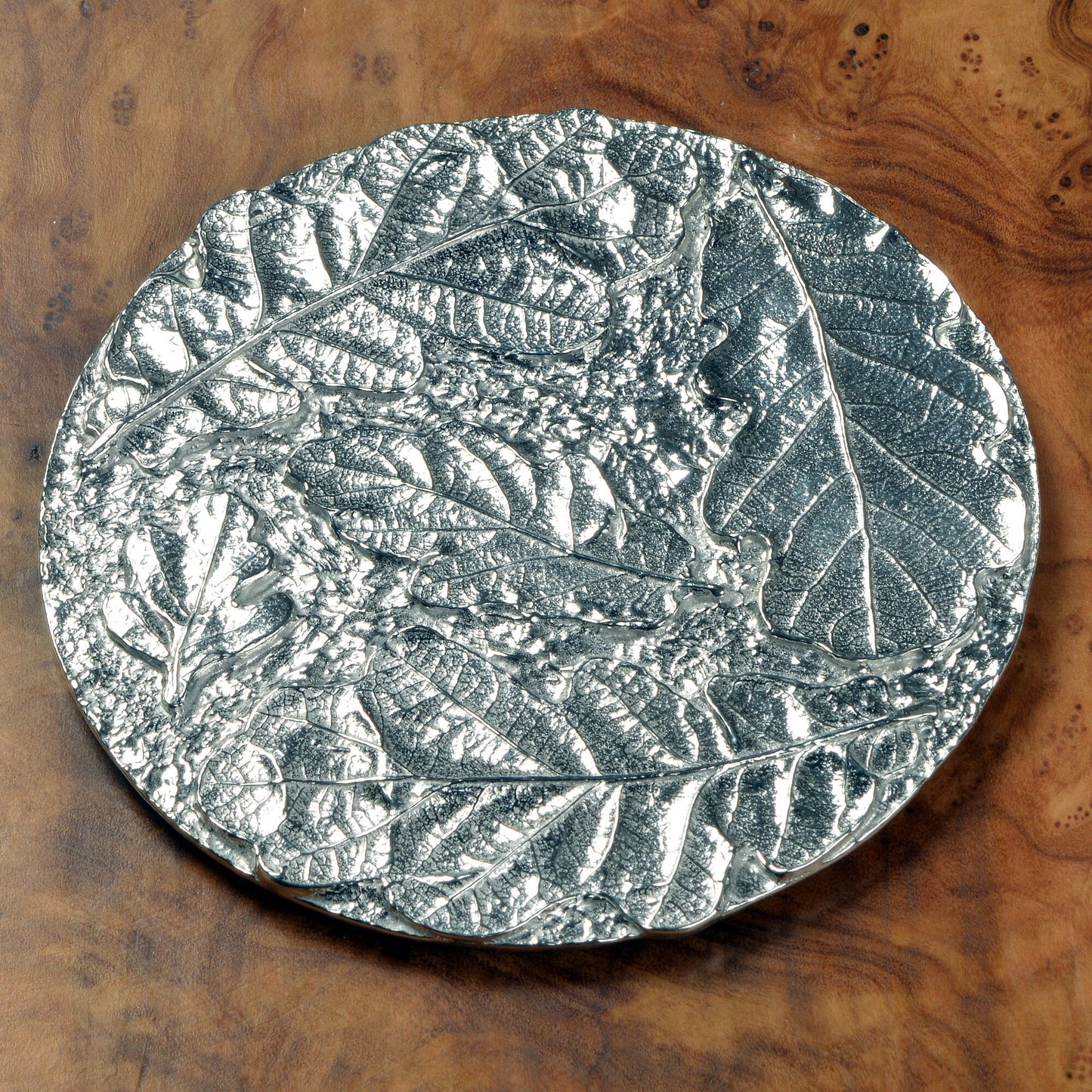 Oak leaf coaster, a circular composition of detailed cast oak leaves form an actractive round pewter drinks coaster. Practical and useful housewarming gifts, ideal gifts for nature lovers, UK handmade 