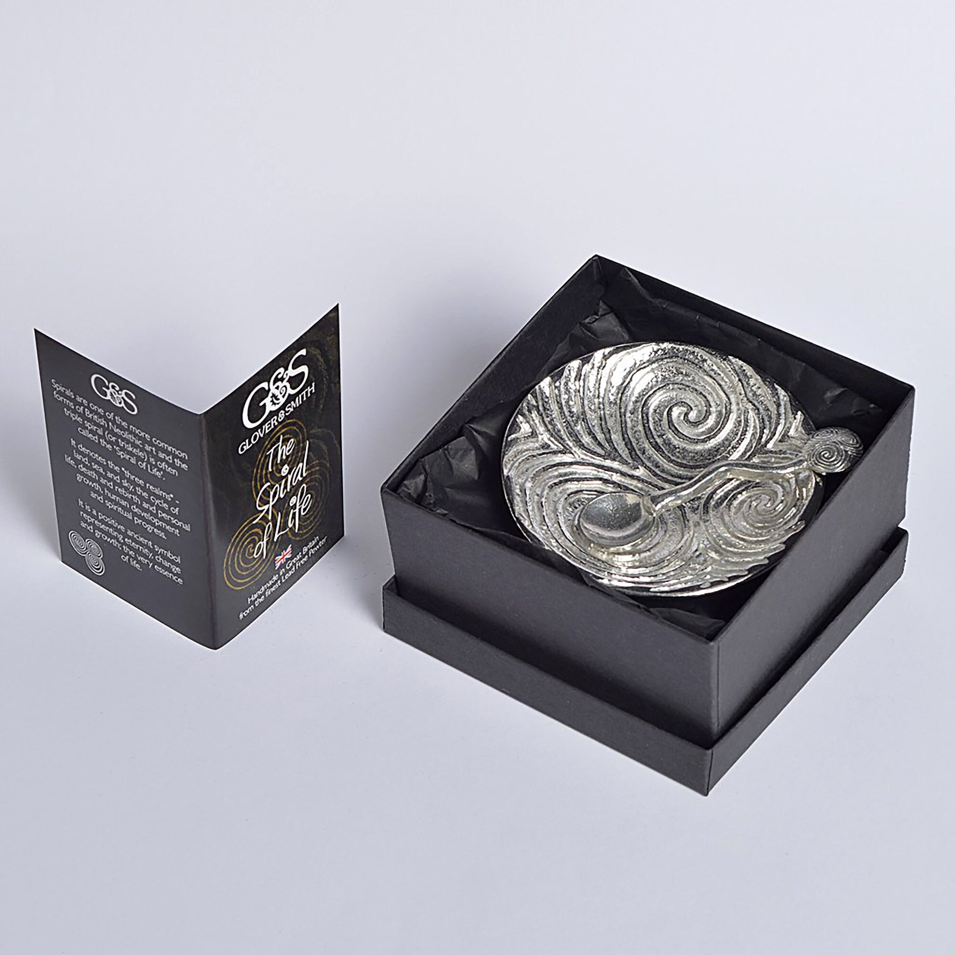 Spiral of life pewter bowl and spoon set. Its design is based on the the triple spiral (or triskele) often called the Spiral of Life as found carved on the entrance stone at Newgrange in Ireland. With matching spirals spoon. Celtic spiral gifts.