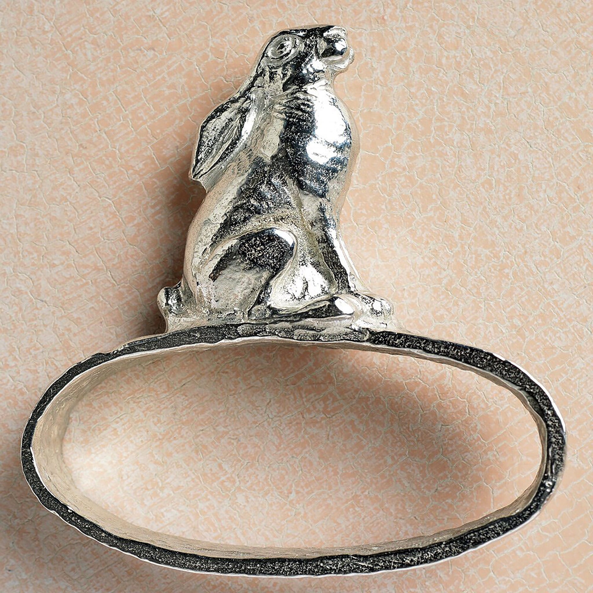 A set of 6 textured pewter oval-shaped napkin rings. Each one has a beautifully observed sculpture of a British countryside animal on top. Perfect country gifts. The set consists of a: fox, hound, chicken, duck, wren and hare.