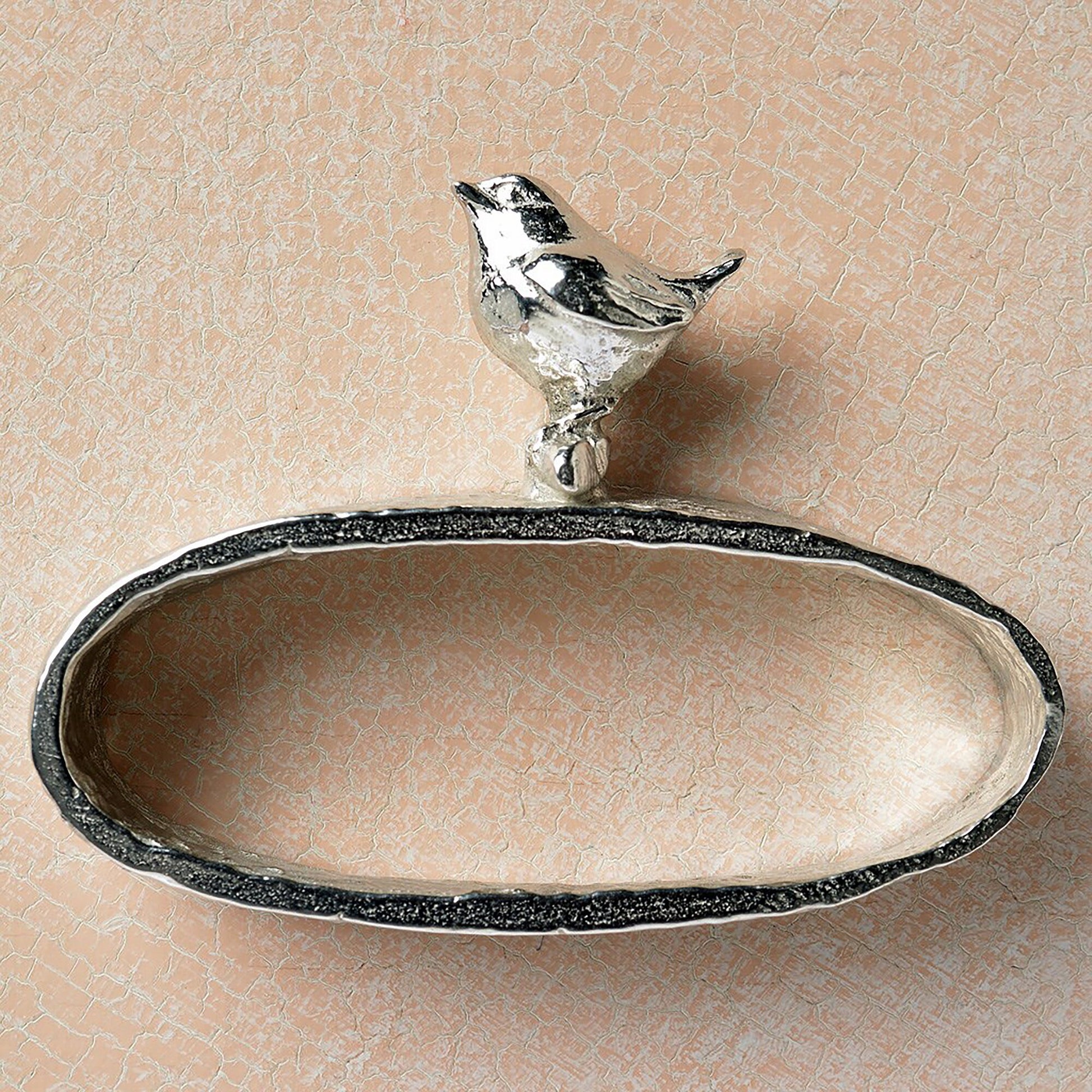 A set of 6 textured pewter oval-shaped napkin rings. Each one has a beautifully observed sculpture of a British countryside animal on top. Perfect country gifts. The set consists of a: fox, hound, chicken, duck, wren and hare.