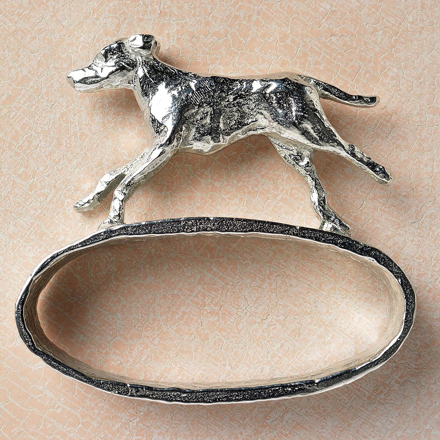 A set of 6 textured pewter oval-shaped napkin rings. Each one has a beautifully observed sculpture of a British countryside animal on top. Perfect country gifts. The set consists of a: fox, hound, chicken, duck, wren and hare.