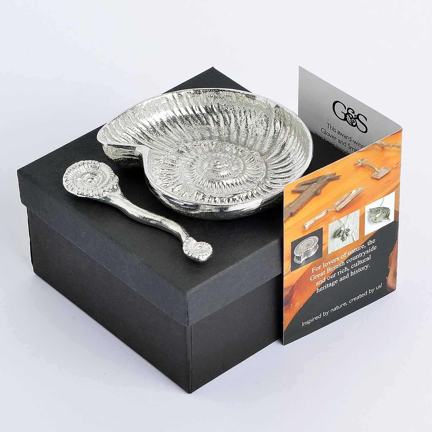 Ammonite fossil pewter bowl and spoon set. The ammonite bowl is cast from a real ammonite found on the Dorset coast. The accompanying spoon has an ammonite bowl and a smaller fossil on the end of a curved handle. UK handmade.