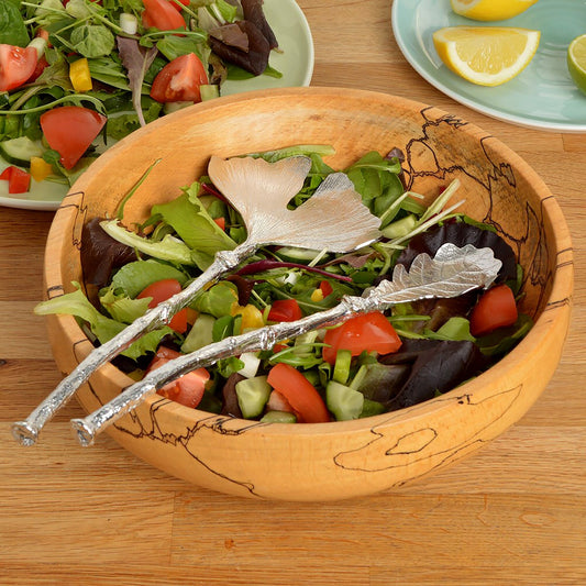 A pair of leaf design salad servers with ginkgo leaf and oak leaf spoons on detailed twig textured handles. Pewter serving spoons handmade in the UK. A perfect 10th (Tin) ten year wedding anniversary gift (Our pewter is 95% tin). UK handmade